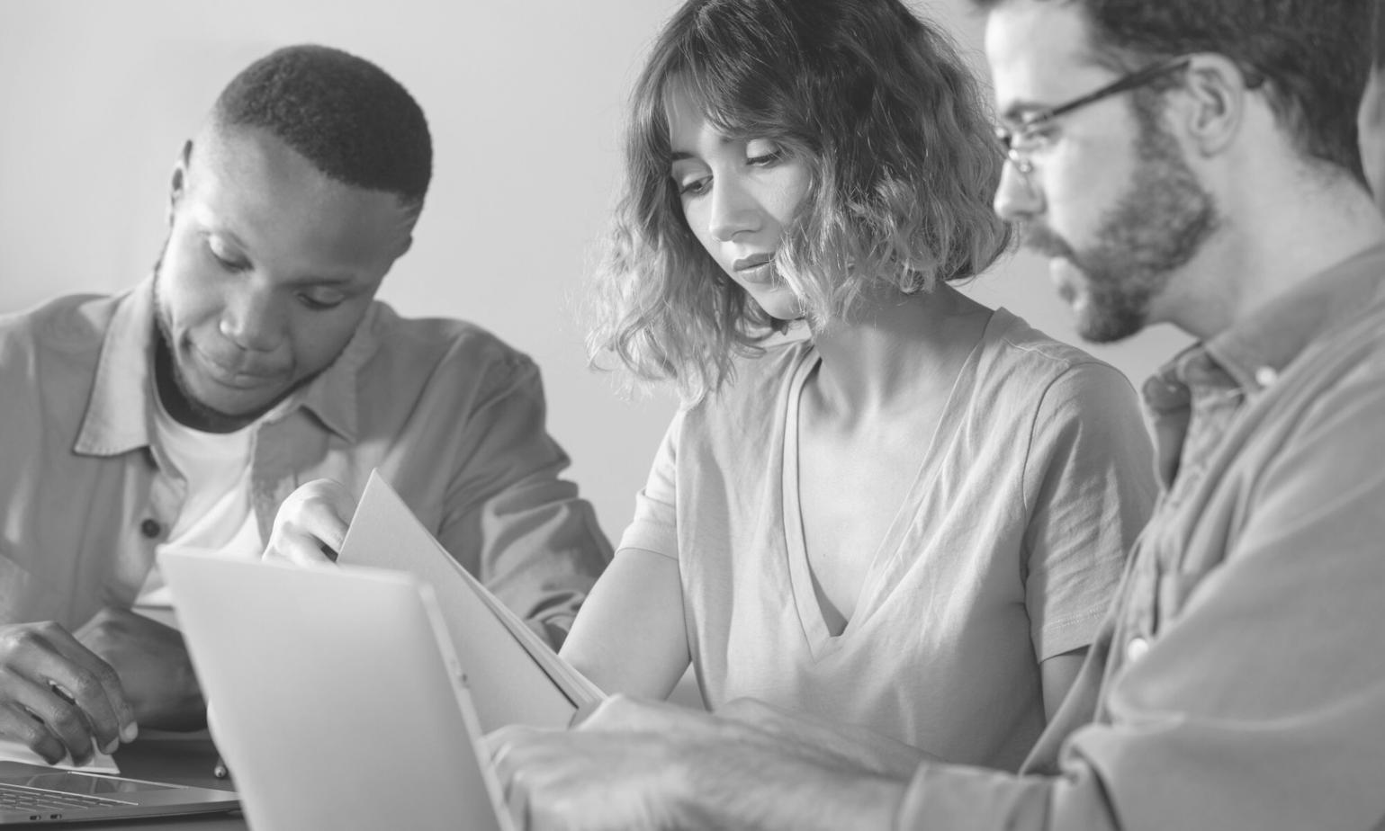 Financial professionals analyzing data and charts